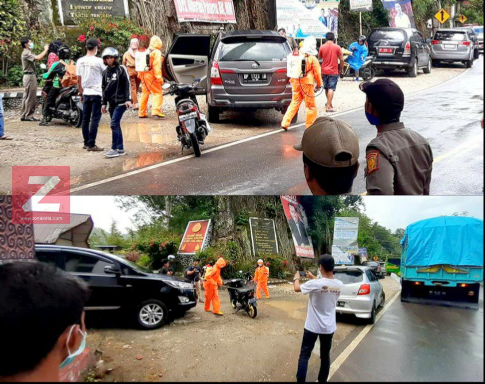 Pintu Masuk Tana Toraja Kendaraan Disemprot Disinfektan, Suhu Tubuh Penumpang Diperiksa 4 Pintu Masuk Tana Toraja Kendaraan Disemprot Disinfektan, Suhu Tubuh Penumpang Diperiksa